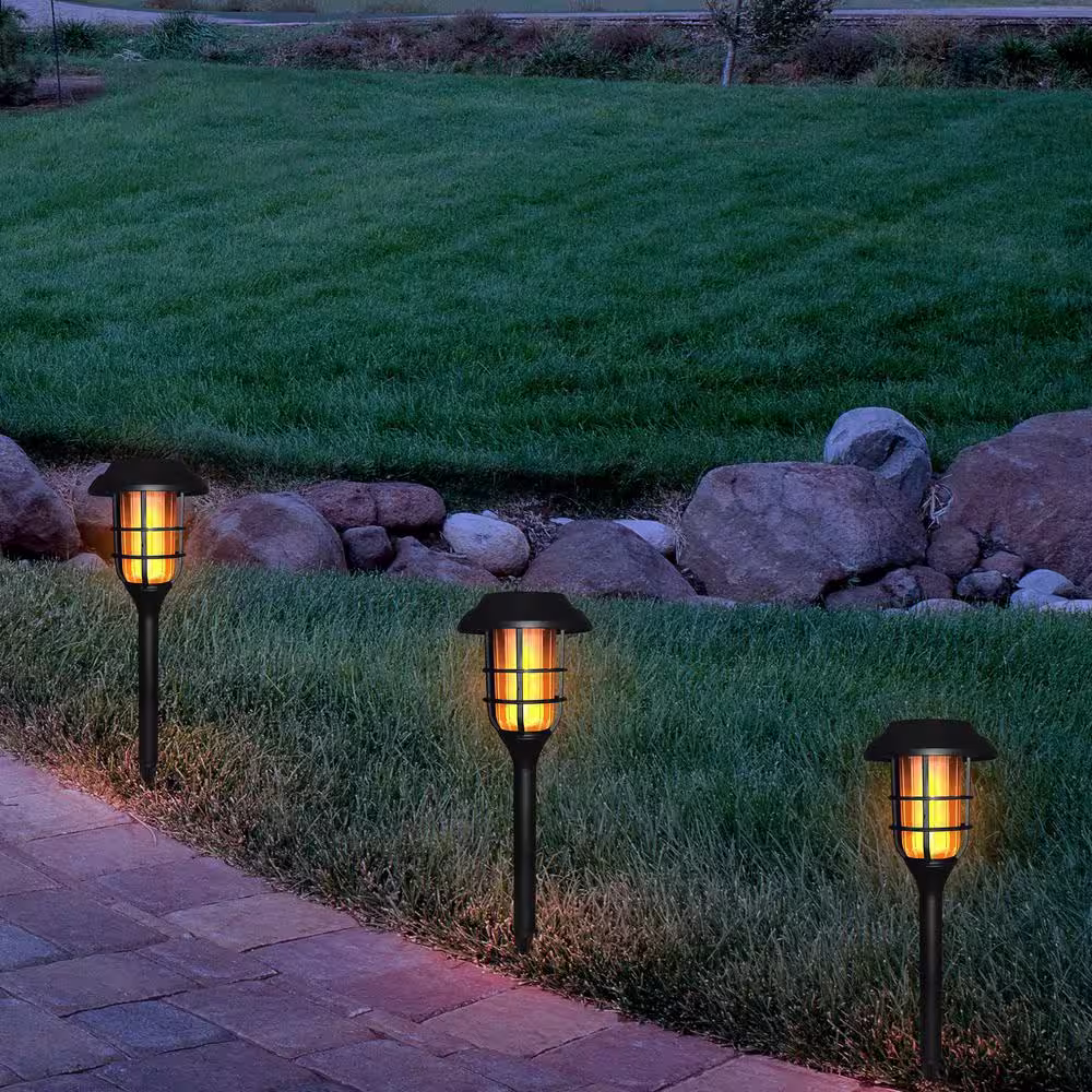 Alpine Corporation 17 in. Tall Outdoor Solar Powered Black LED Path Light Torch Light Stakes (Set of 6)